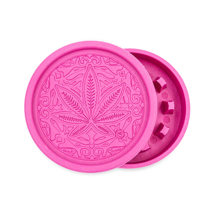 FireFlow Hemp Grinder Trance Leaf in Pink geöffnet mit ornamentalem Hanfblatt-Muster
