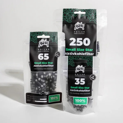 Drei Kailar Small Size Star Papier Aktivkohlefilter Packungen nebeneinander